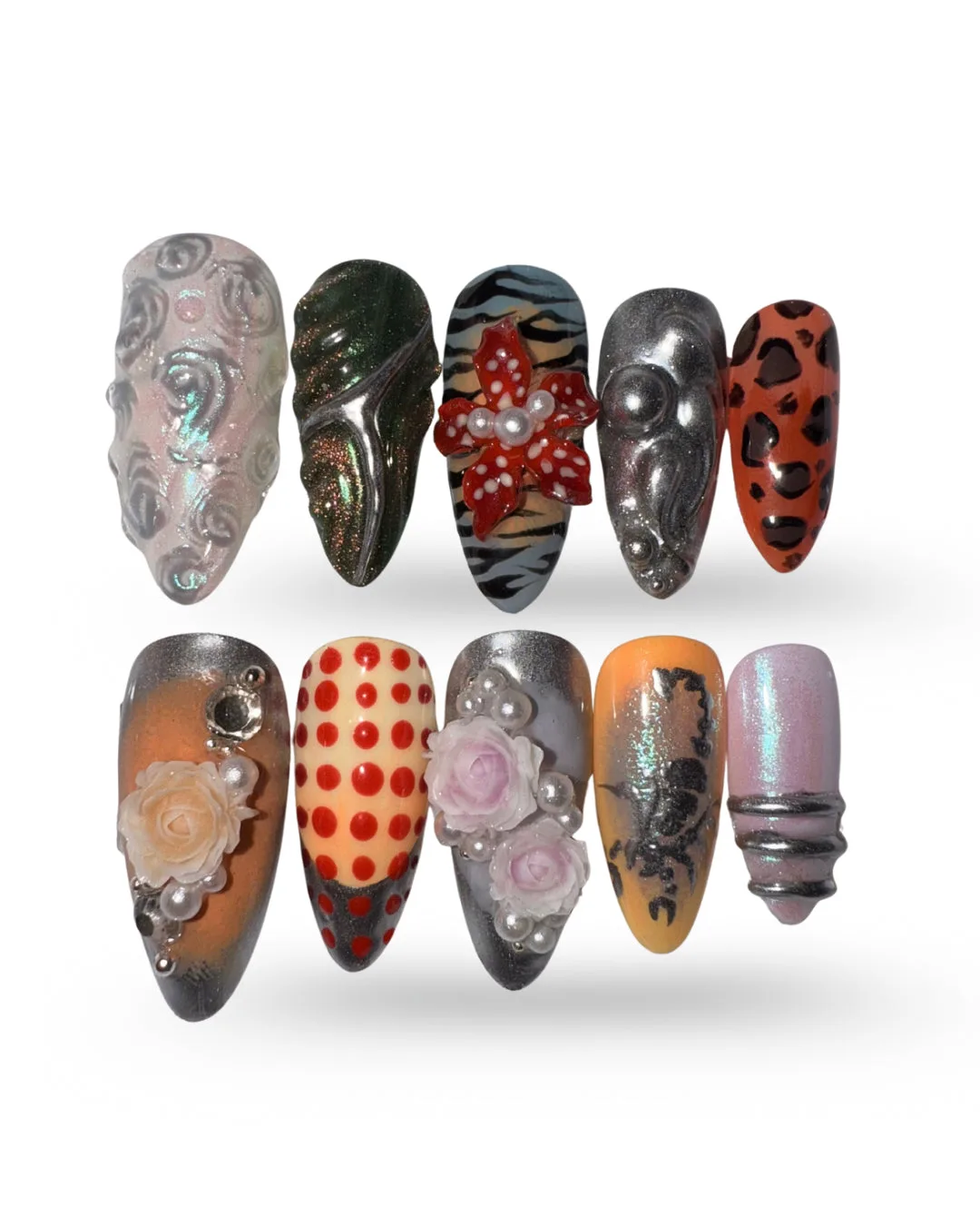 MIXED MEDIUM. Hand-painted chrome press-on nails
