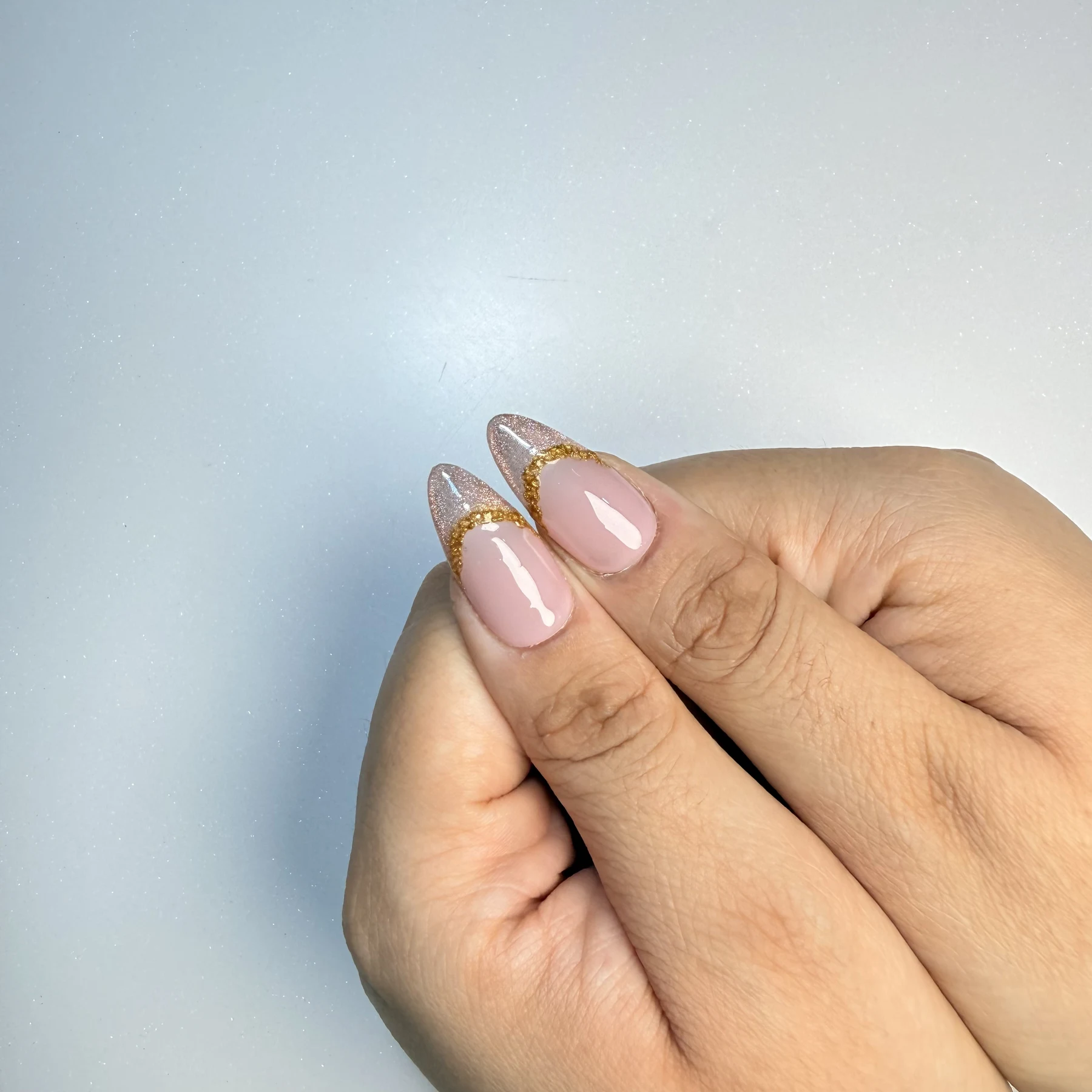 Golden Hour rose gold cat-eye French tip press-on nails with delicate gold detailing